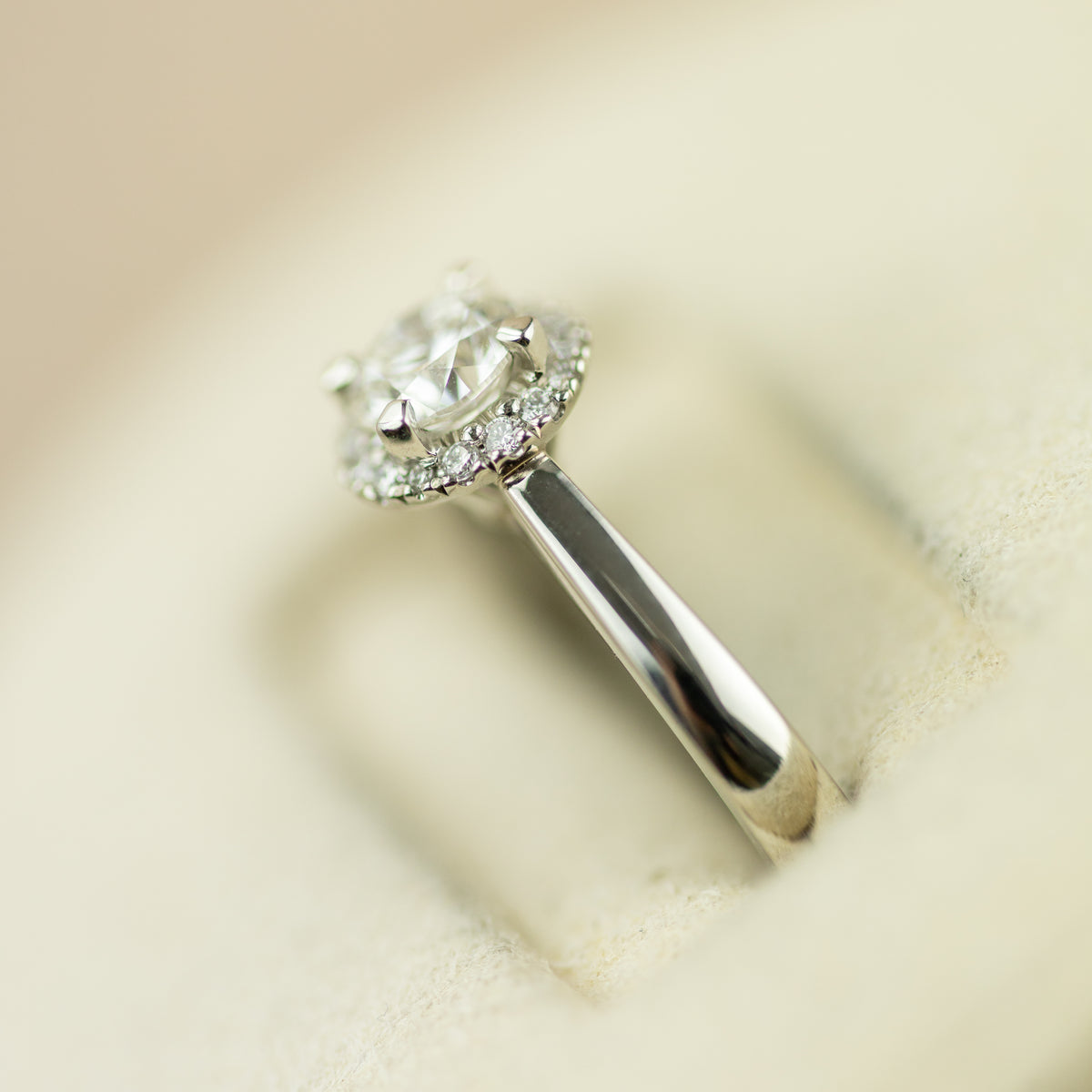 Platinum round 0.50ct GIA certificated diamond halo ring