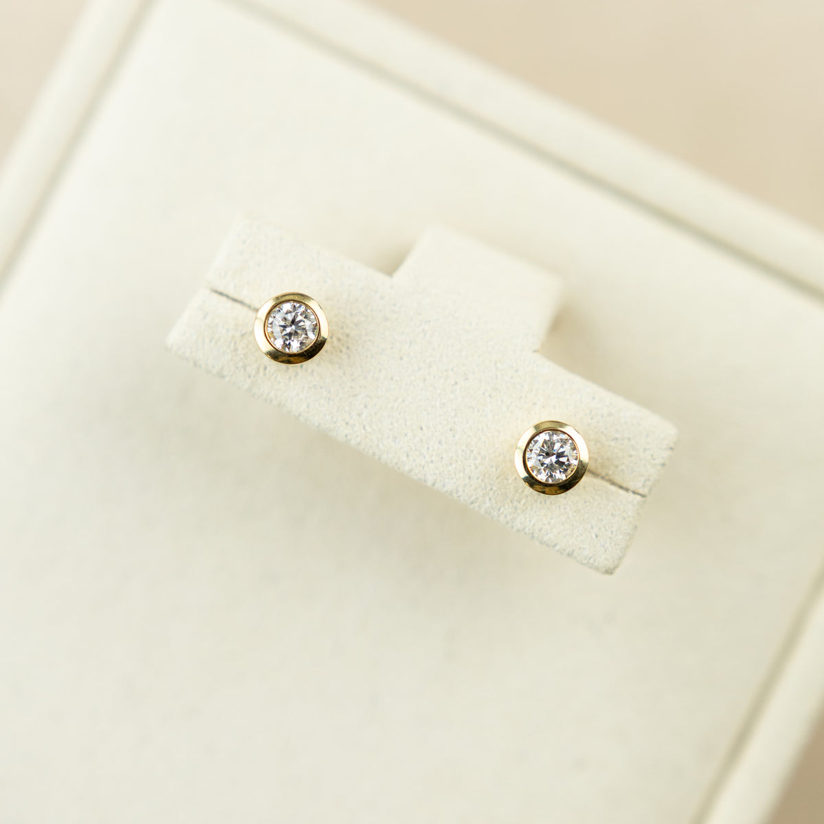 9ct yellow gold round 0.30cttw diamond bezel set stud earrings