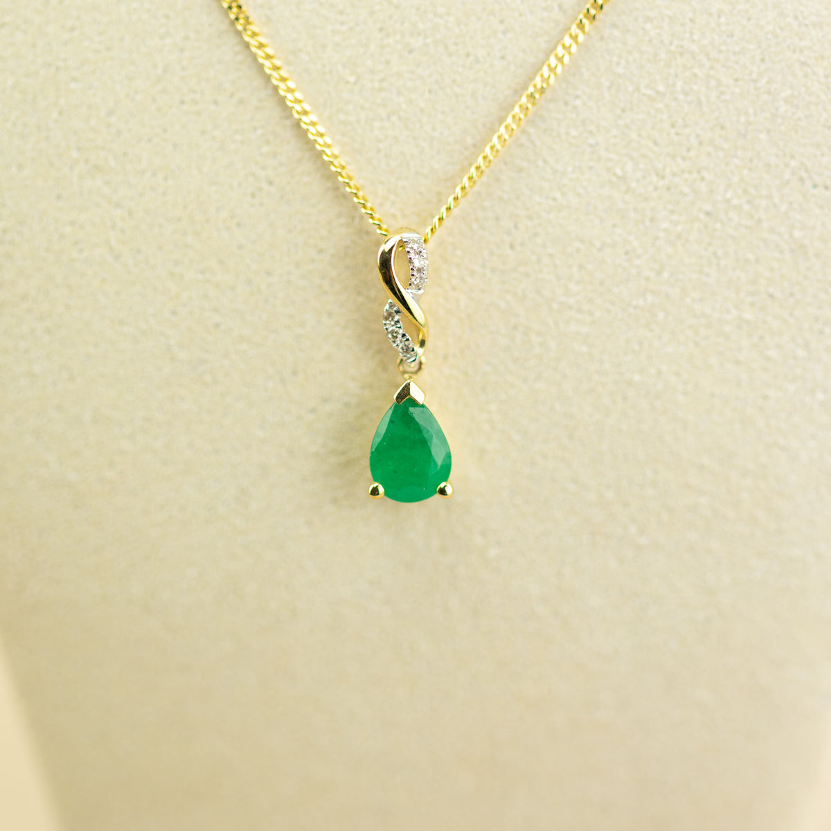 9ct yellow gold emerald pear cut diamond set infinity bale pendant 16-18”