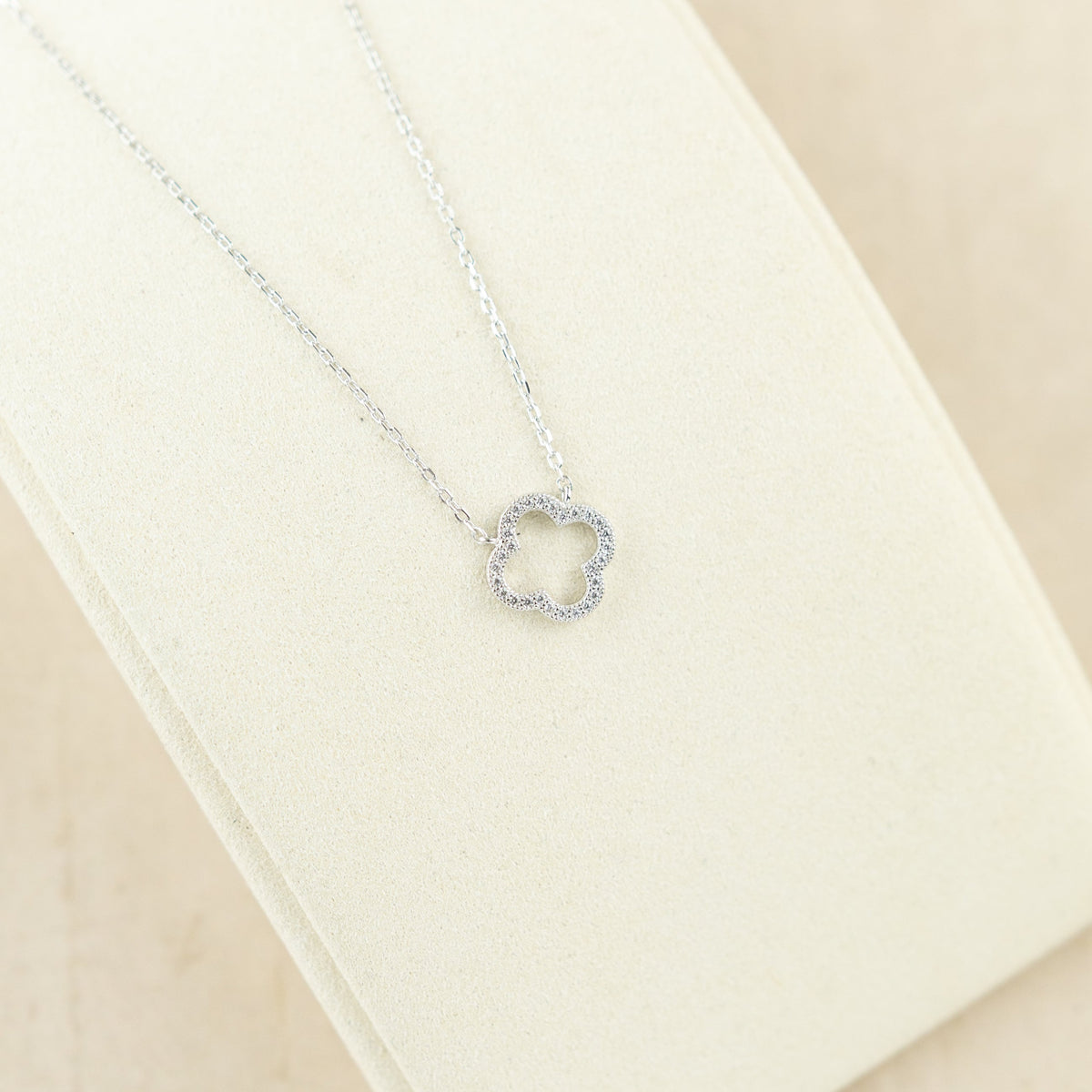 Designer inspired silver rhodium plated cz set open clover necklace