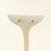 9 Karat White Gold 4 Claw Peridot Studs
