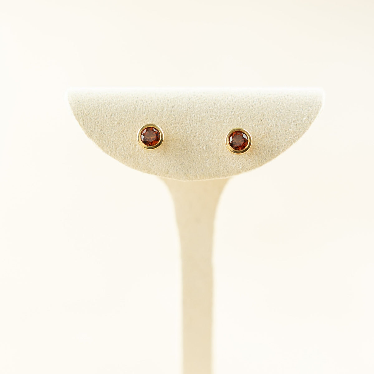 9 Karat Yellow Gold Smooth Bevel Garnet Studs at RR jewellers Yarm UK