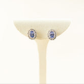 9 Karat Yellow Gold Tanzanite Earrings with Diamond Halo