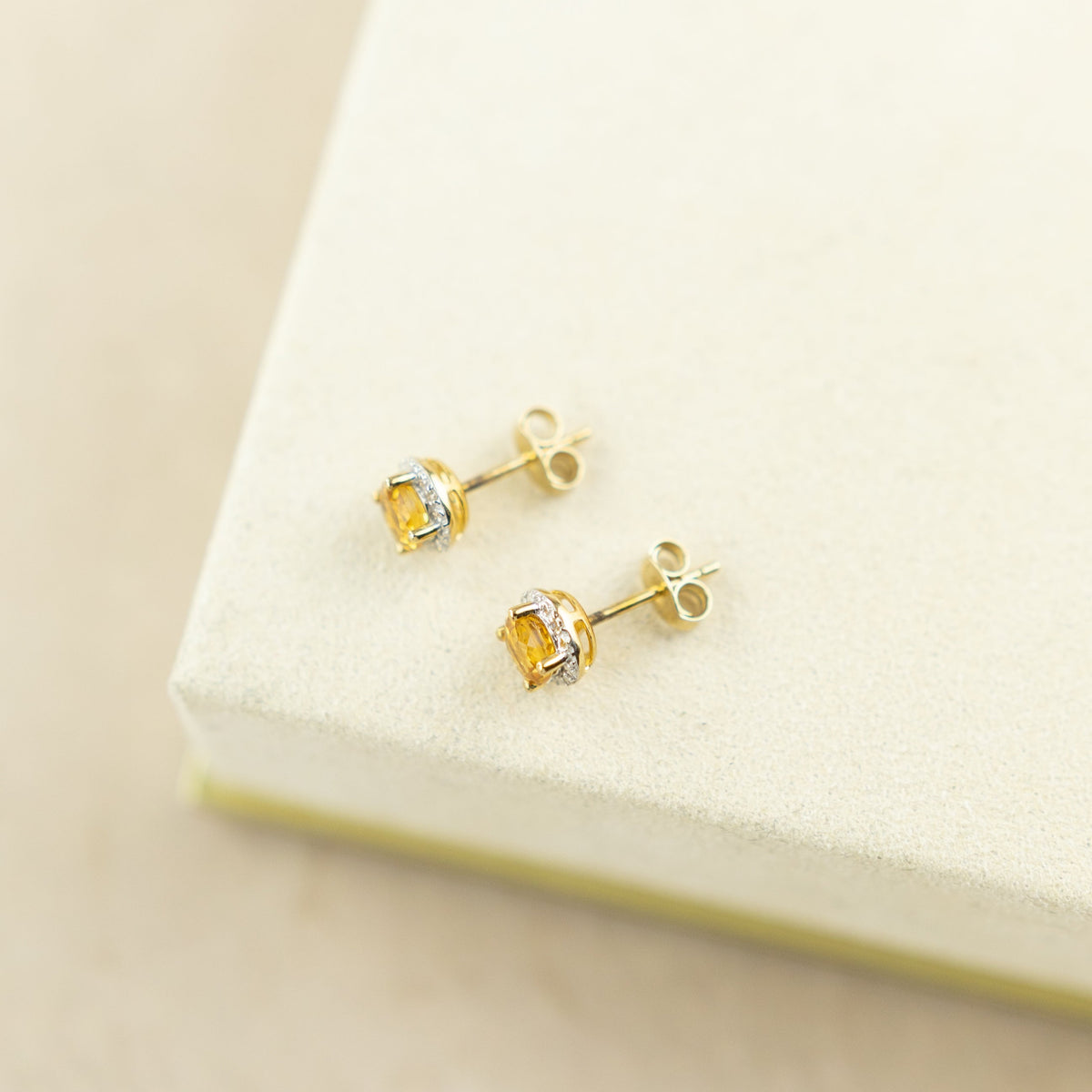 9 Karat Yellow Gold round Citrine Studs with Diamond Halo