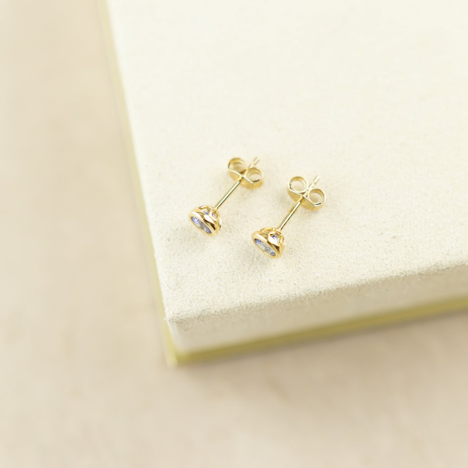 9 Karat Yellow Gold Smooth Bevel Tanzanite Studs at RR Jewellers Yarm UK