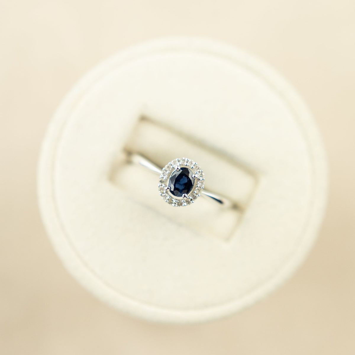 9 Karat White Gold Sapphire Diamond Halo Ring with 0.09ct