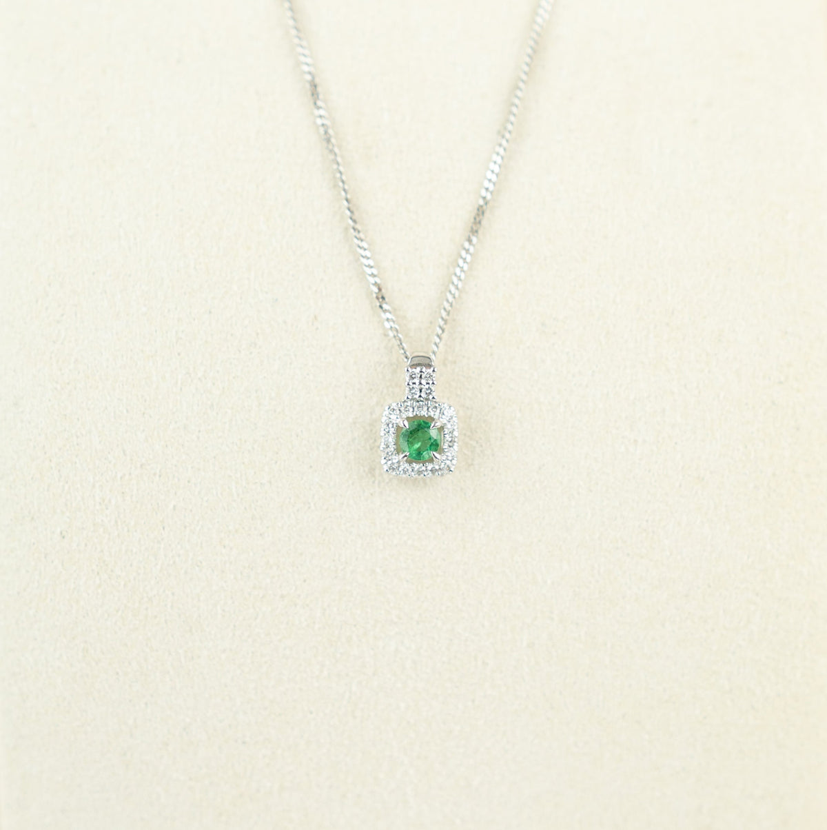 9 Karat White Gold Emerald Cushion Halo Pendant
