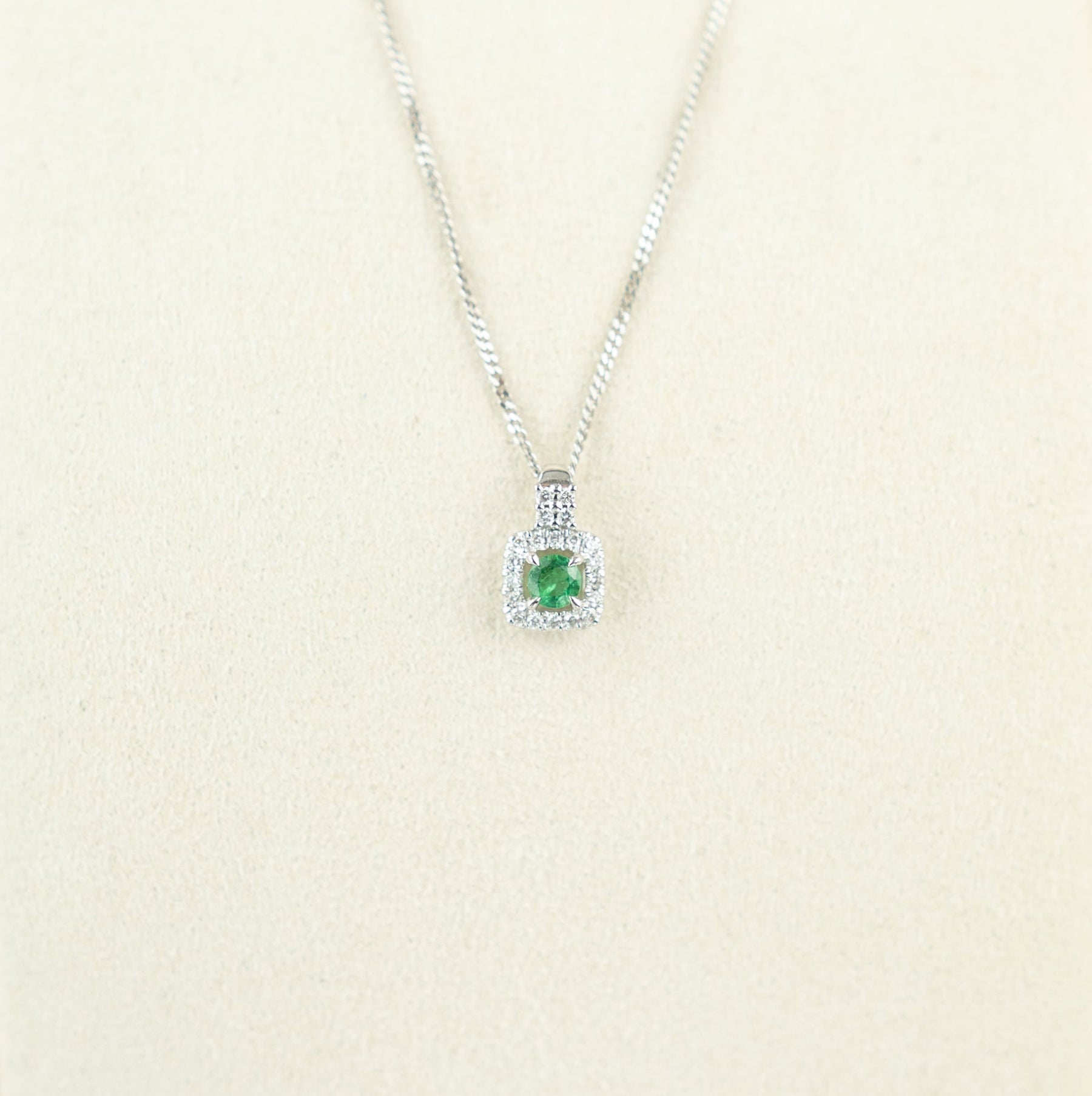 9 Karat White Gold Emerald Cushion Halo Pendant