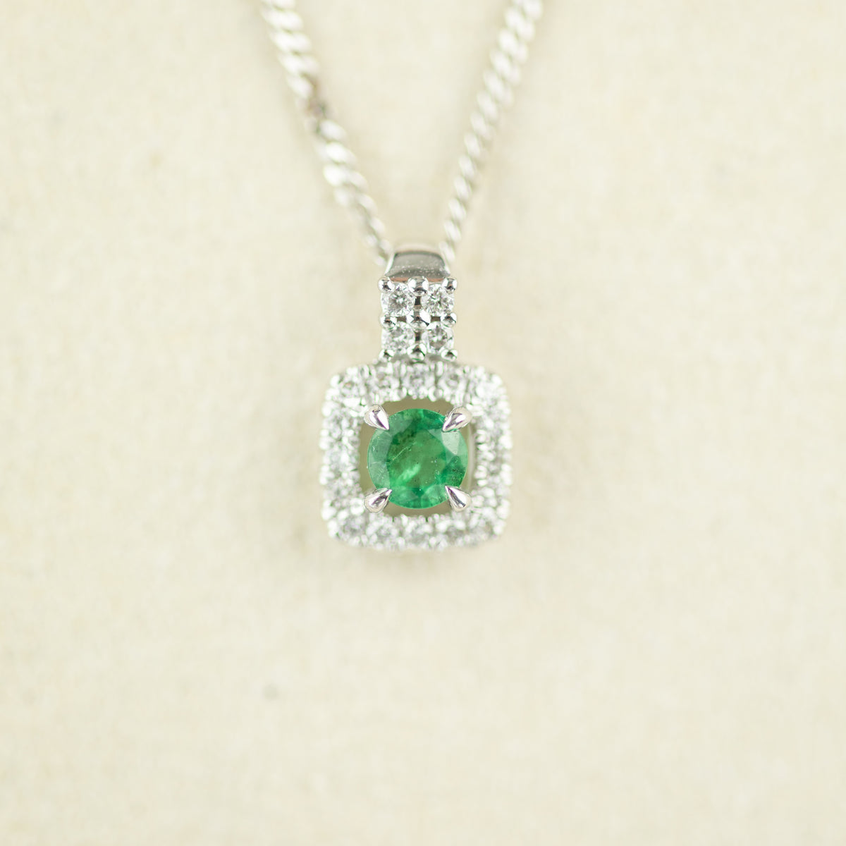 9 Karat White Gold Emerald Cushion Halo Pendant