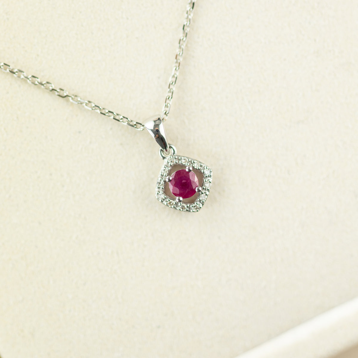 9 Karat White Gold Ruby & Diamond Halo Pendant