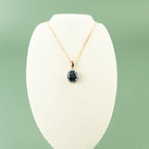 9 Karat Rose Gold London Blue Topaz Halo Pendant