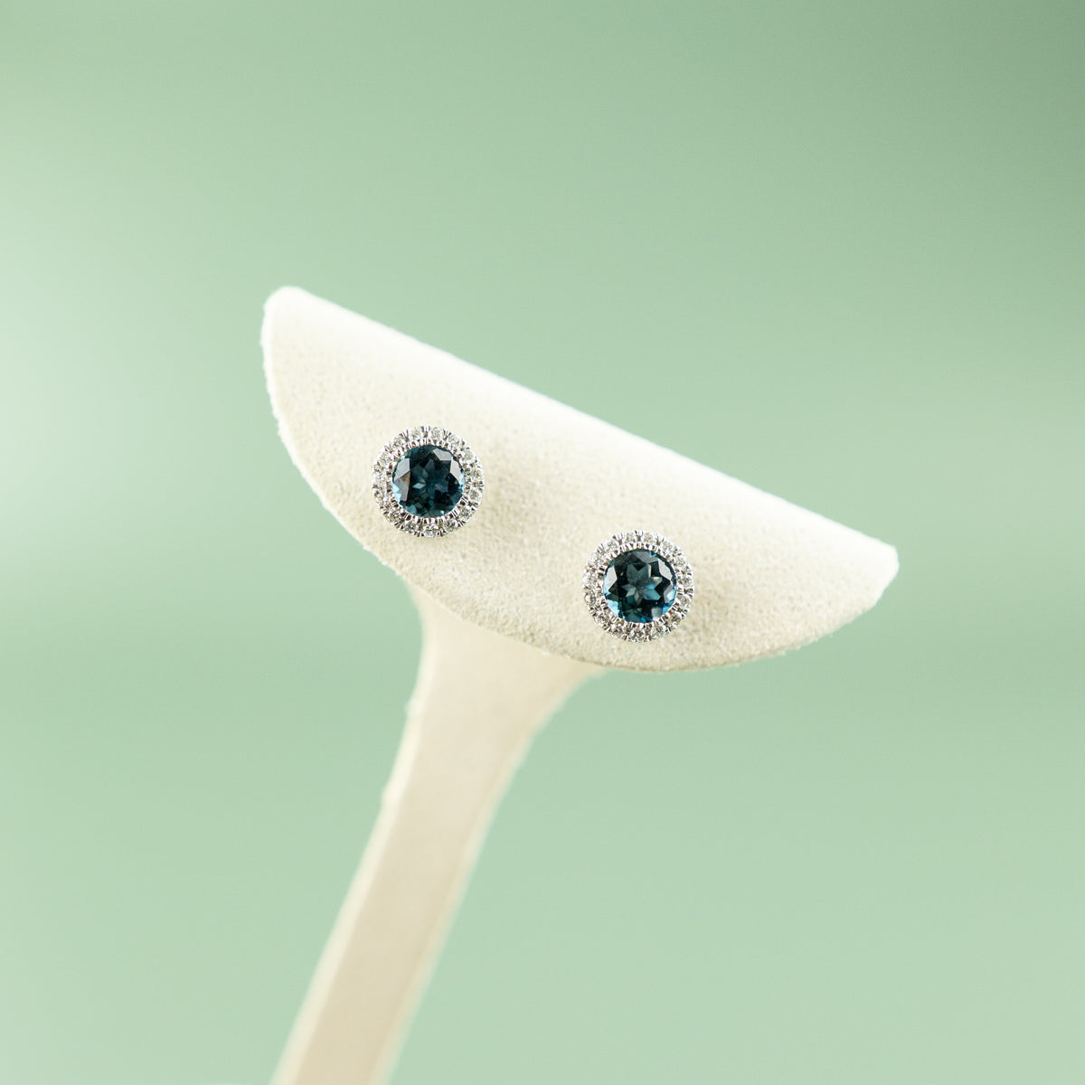 9 Karat White Gold London Blue Topaz Halo Studs 0.18ct