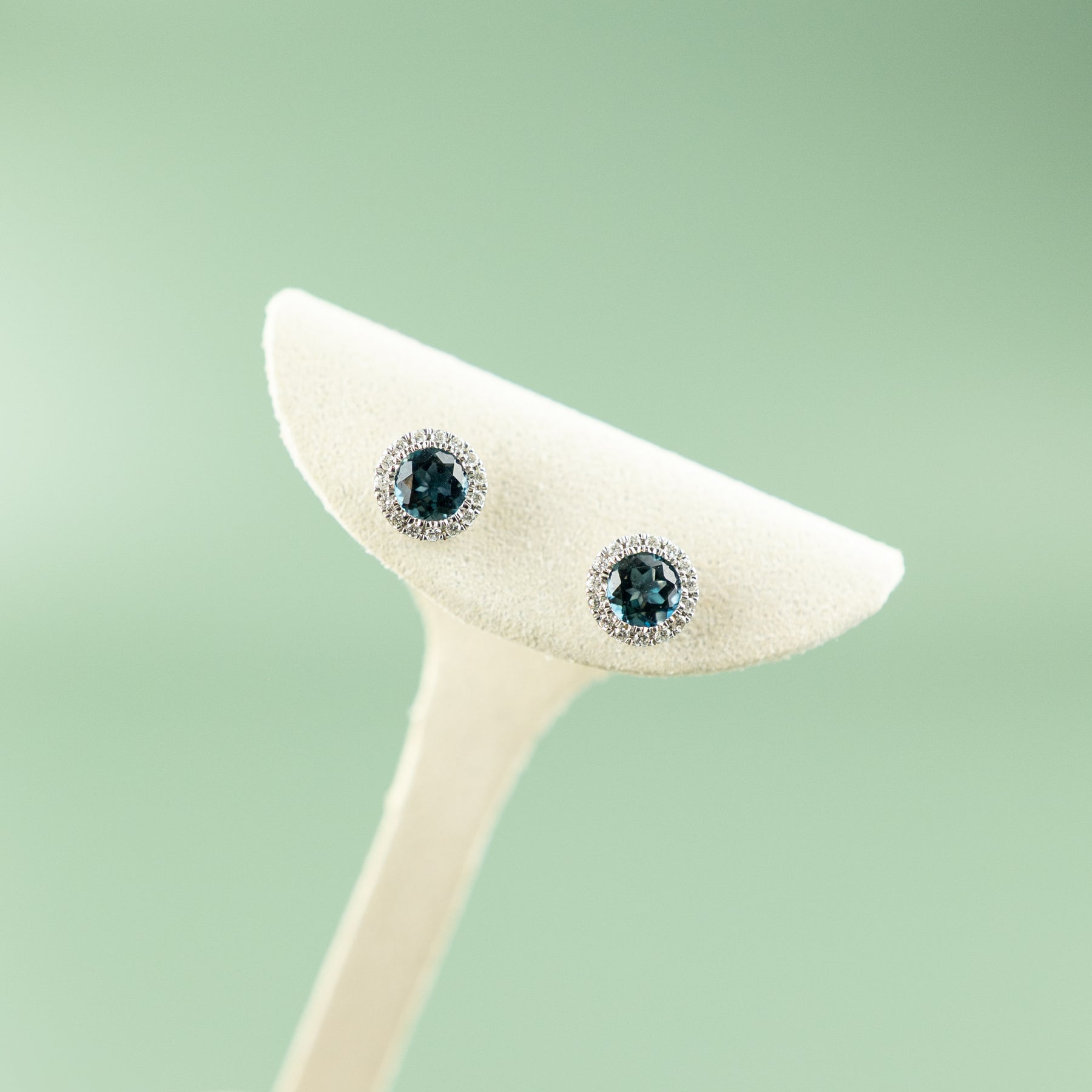 9 Karat White Gold London Blue Topaz Halo Studs 0.18ct