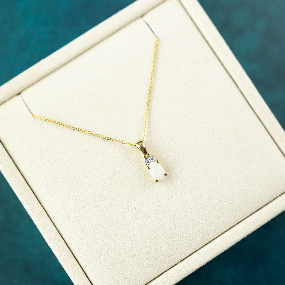 9 Karat Yellow Gold Opal Diamond Accent Pendant