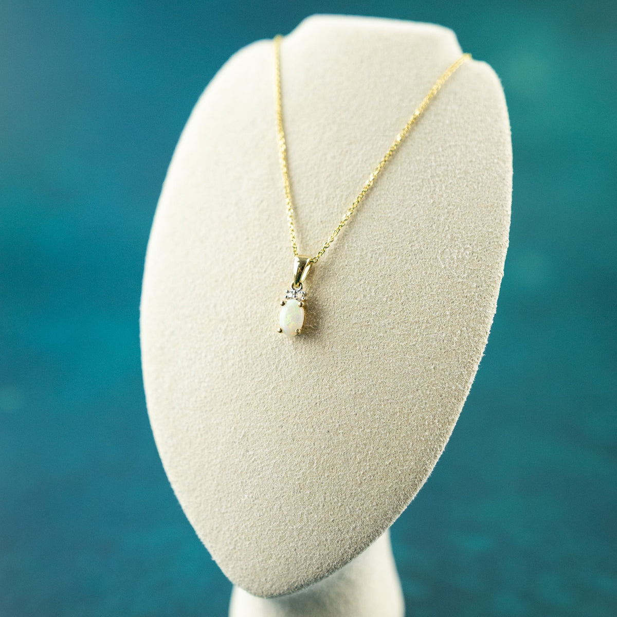 9 Karat Yellow Gold Opal Diamond Accent Pendant