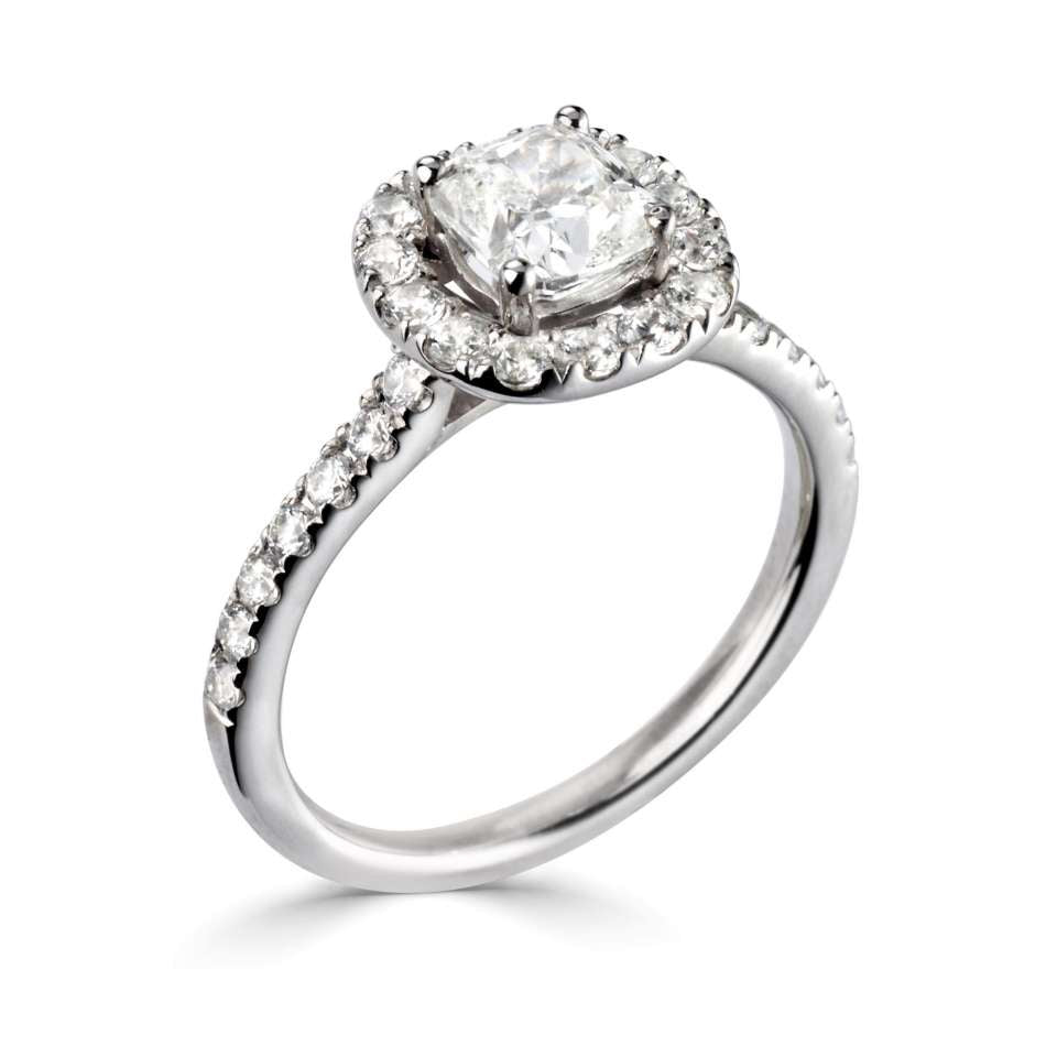 Platinum 0.70ct cushion cut diamond halo ring with diamond set shoulders