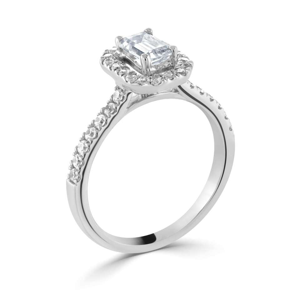 Platinum 0.33ct emerald cut lab diamond halo ring with diamond shoulders