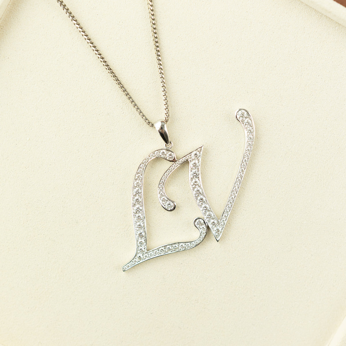 Pre - Loved 18 Karat White Gold LV Diamond Initial Pendant