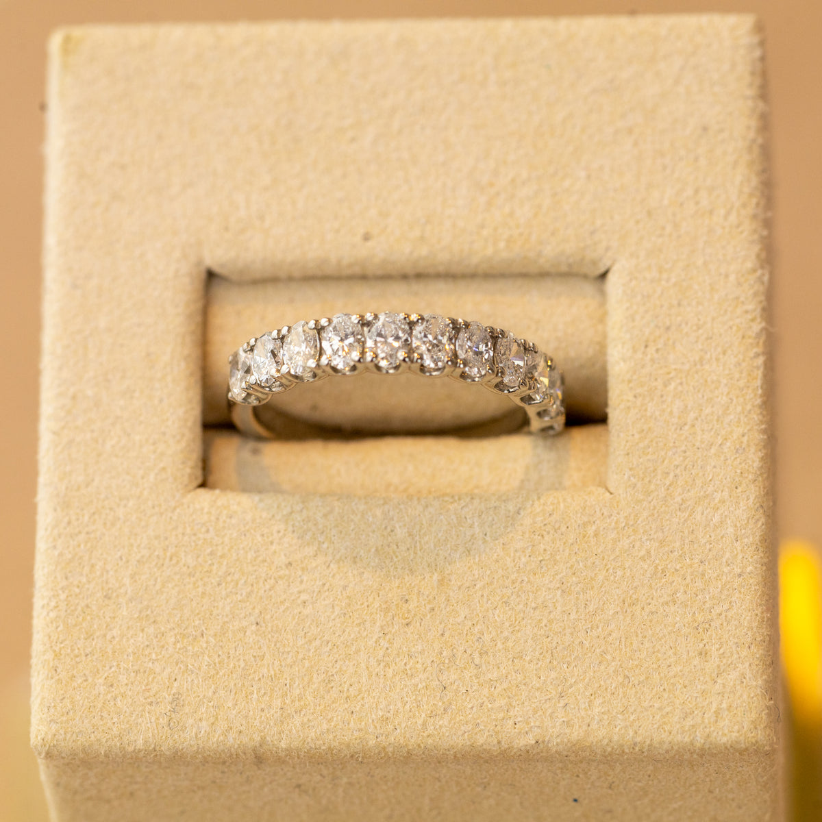 Platinum 1.10ct oval cut diamond half eternity ring