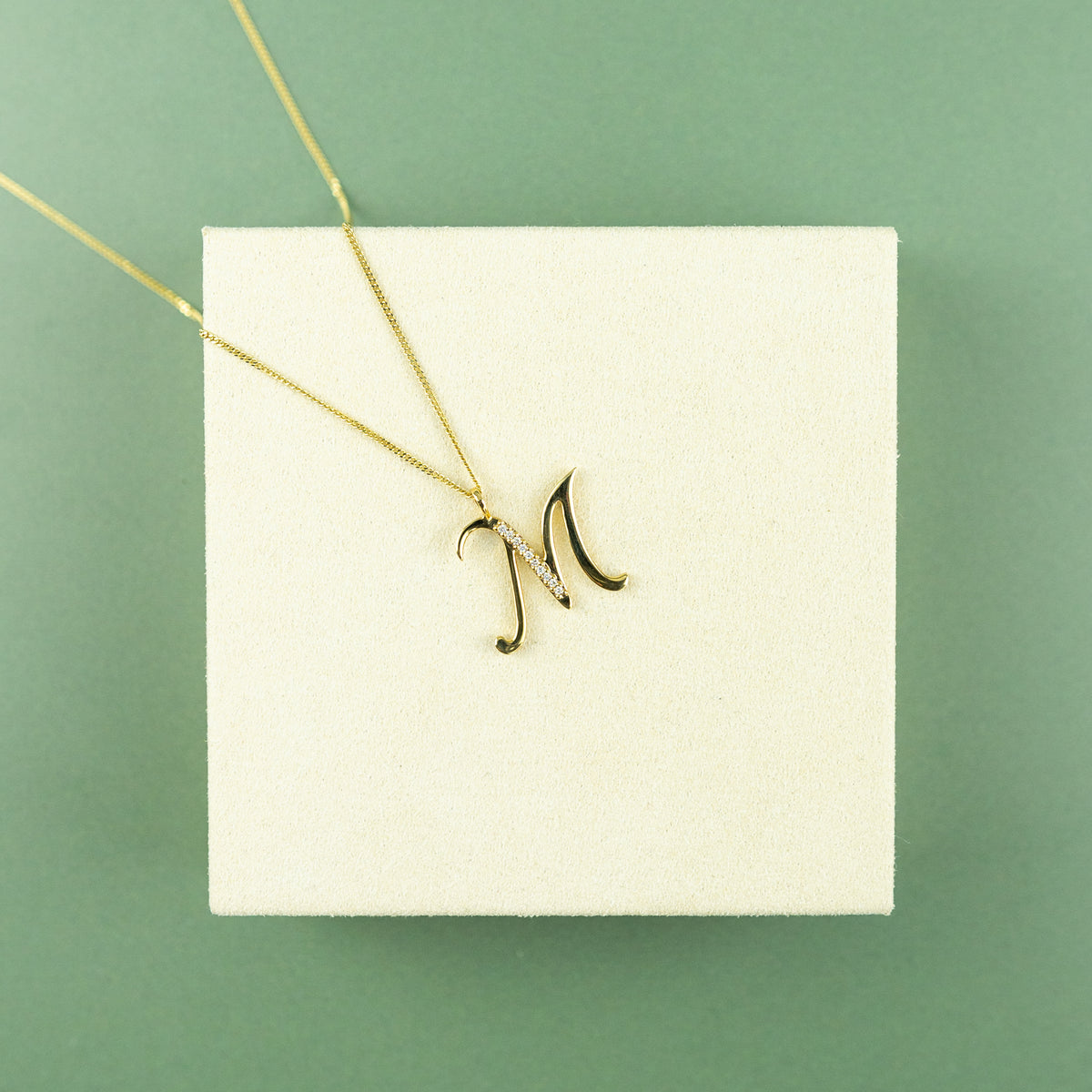 9ct Yellow Gold & Diamond 'M' Initial Pendant on 16 - 18 inch Curb Chain at RR jewellers Yarm uk