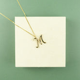 9ct Yellow Gold & Diamond 'M' Initial Pendant on 16 - 18 inch Curb Chain at RR jewellers Yarm uk