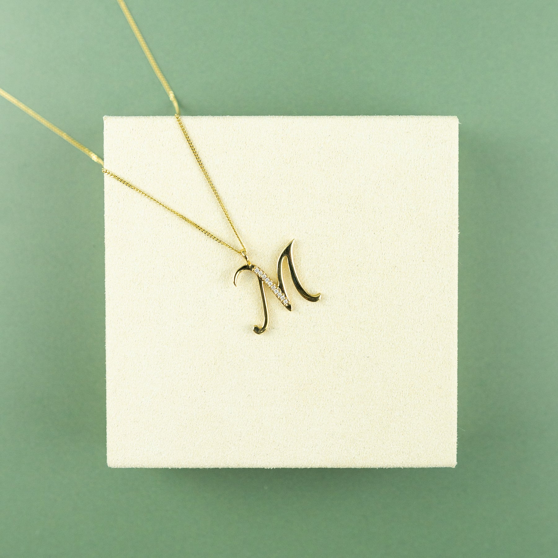 9ct Yellow Gold & Diamond 'M' Initial Pendant on 16 - 18 inch Curb Chain at RR jewellers Yarm uk