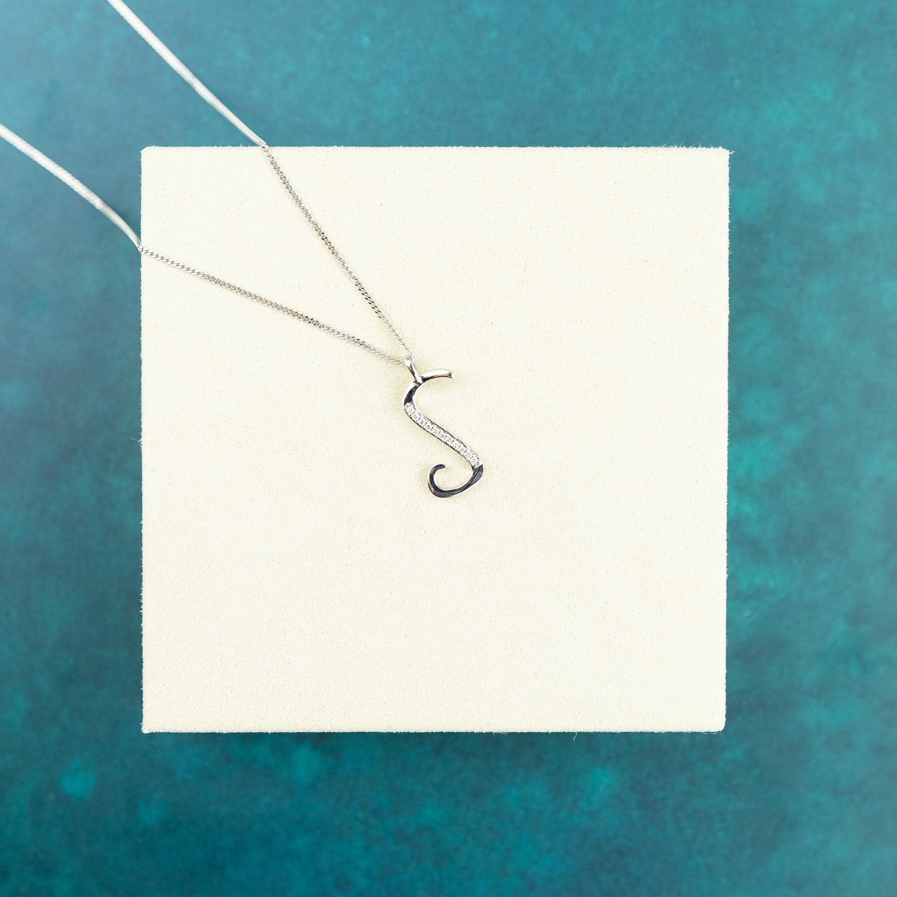 9ct white gold diamond initial S necklace 16-18 inch curb chain.