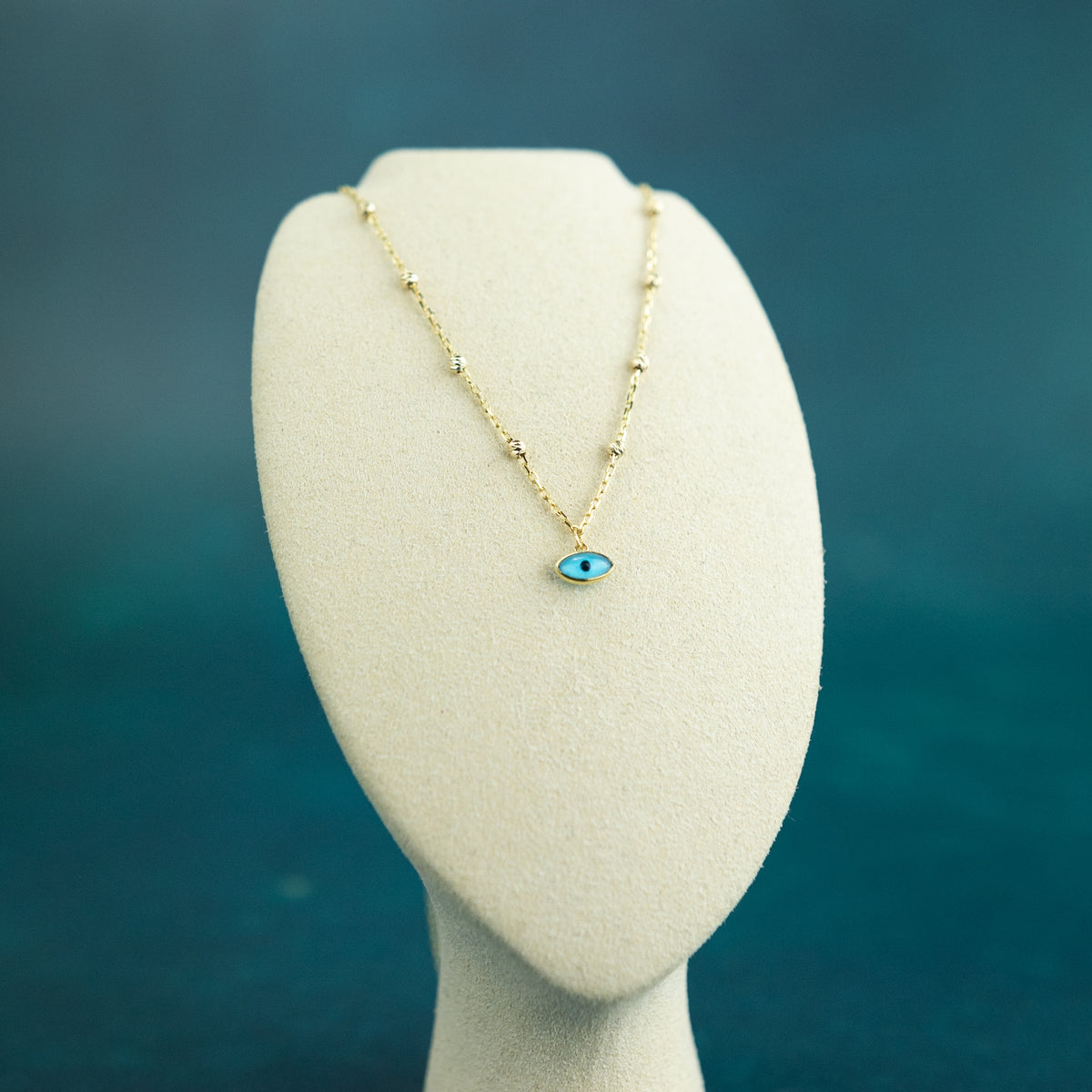 9 Karat Yellow Gold Evil Eye Necklace at RR Jewellers UK