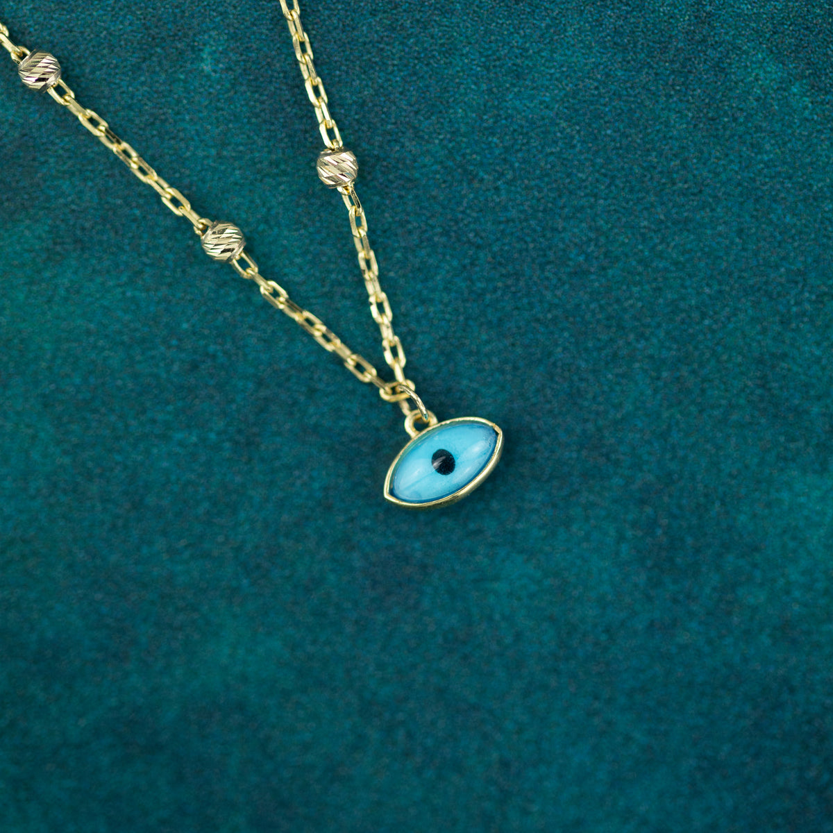 9 Karat Yellow Gold Evil Eye Necklace at RR Jewellers UK