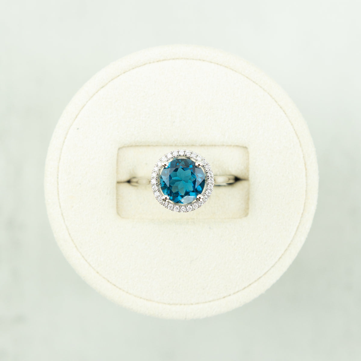 18 Karat White Gold Round London Blue Halo Ring at RR Jewellers