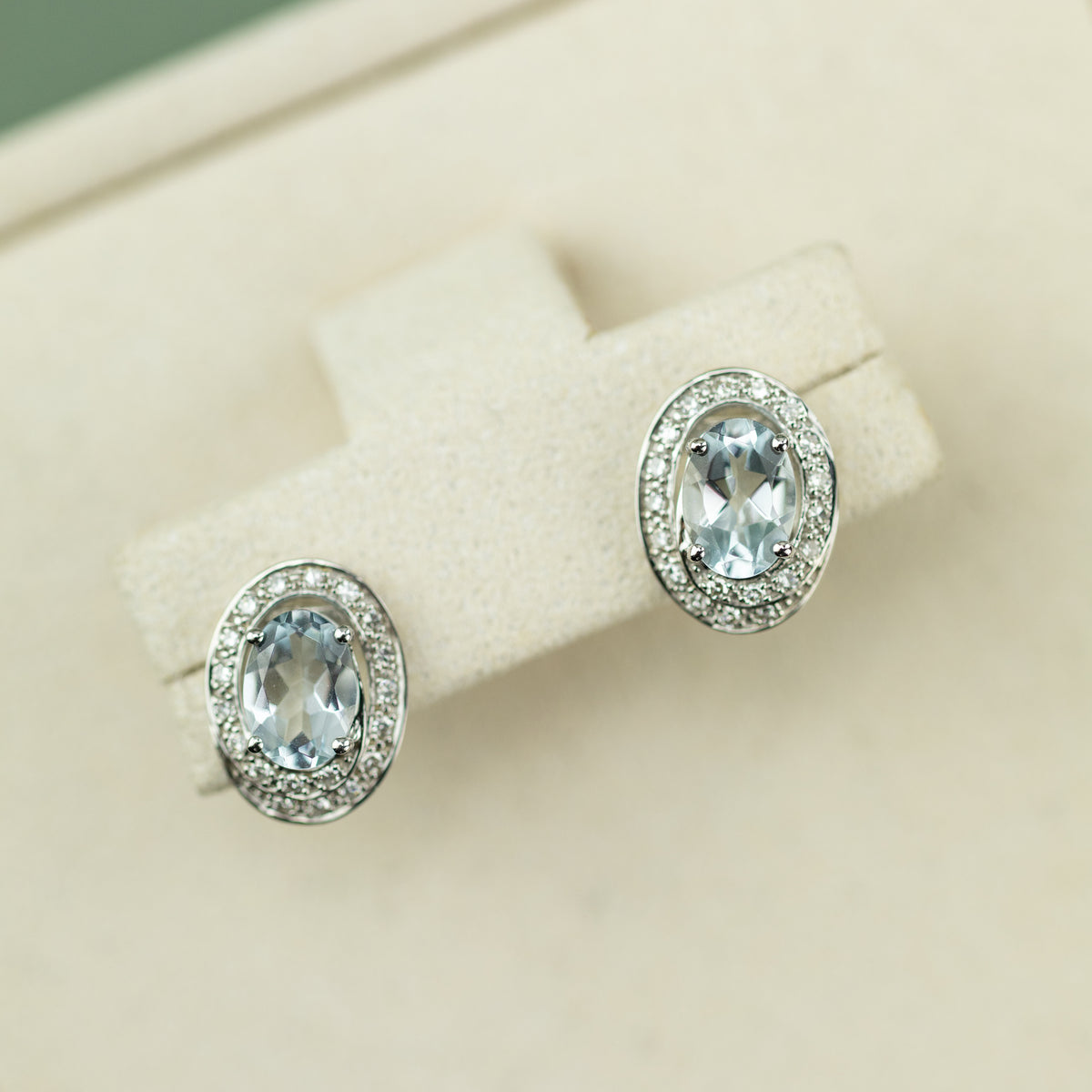 9 Karat White Gold Aquamarine Earrings with Diamond Spiral Halo at RR Jewellers Yarm