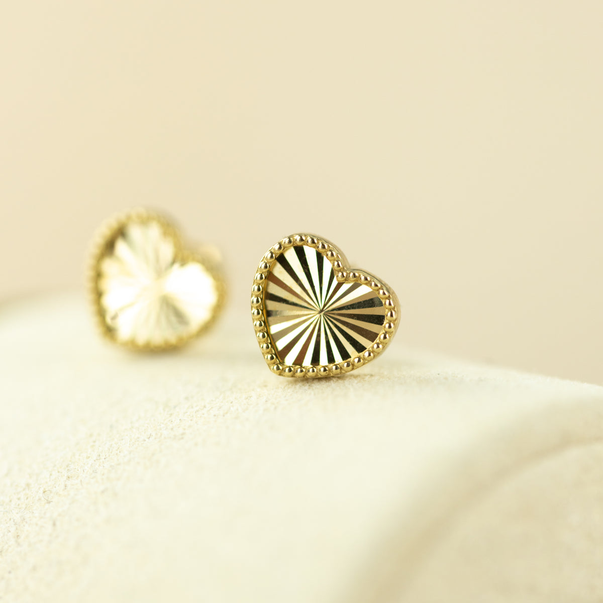 9ct yellow gold 6.5mm diamond cut beaded edge heart studs earrings at RR Jewellers UK