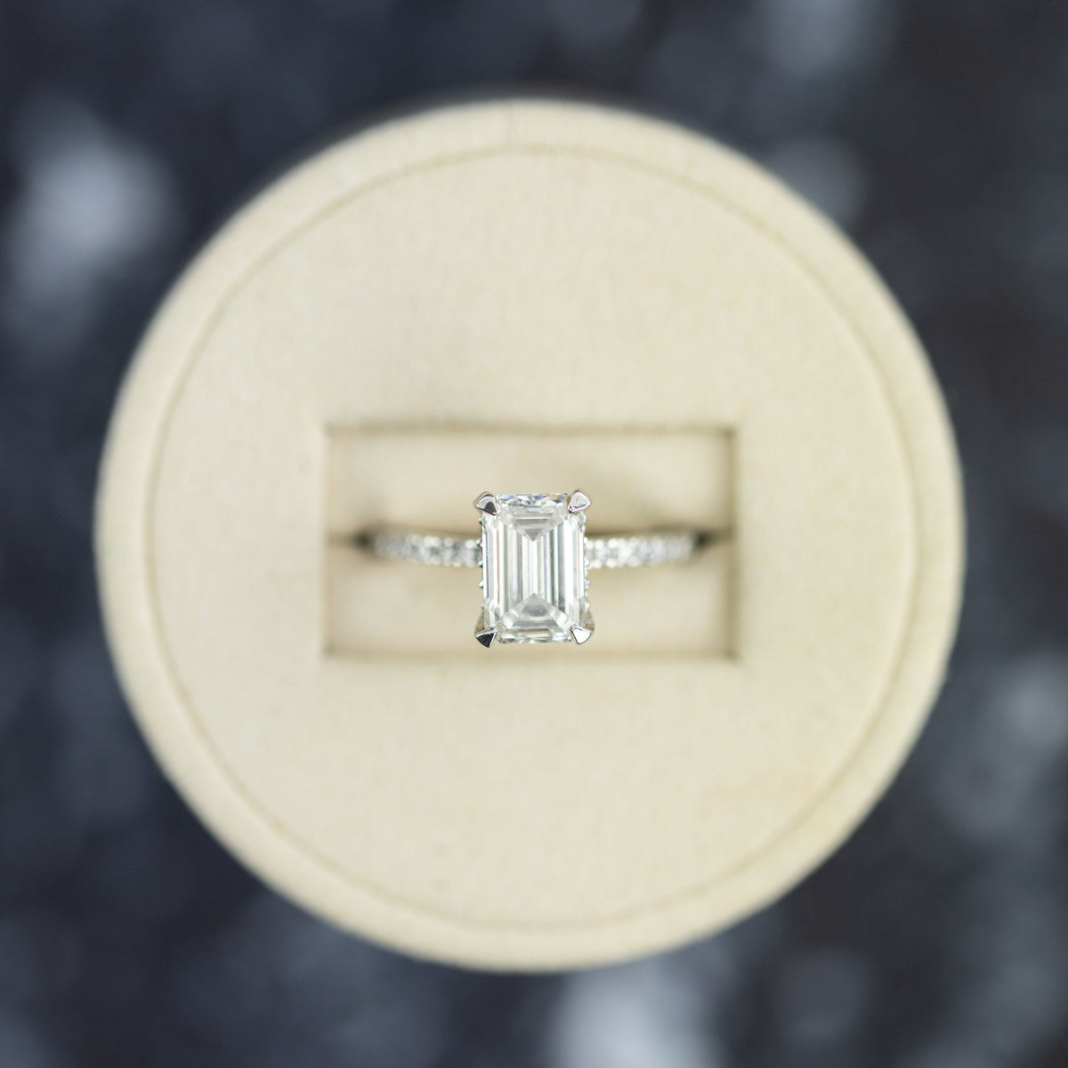 2.39 Carat, Emerald Cut Hidden Halo Ring with Diamond Shoulders available at RR Jewellers