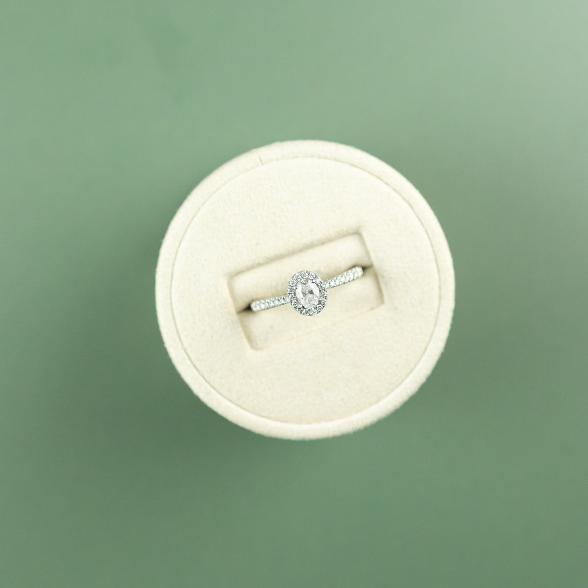 Pre - Loved Platinum & Diamond Oval Halo Ring with 0.50ct weight at RR Jewellers Yarm UK