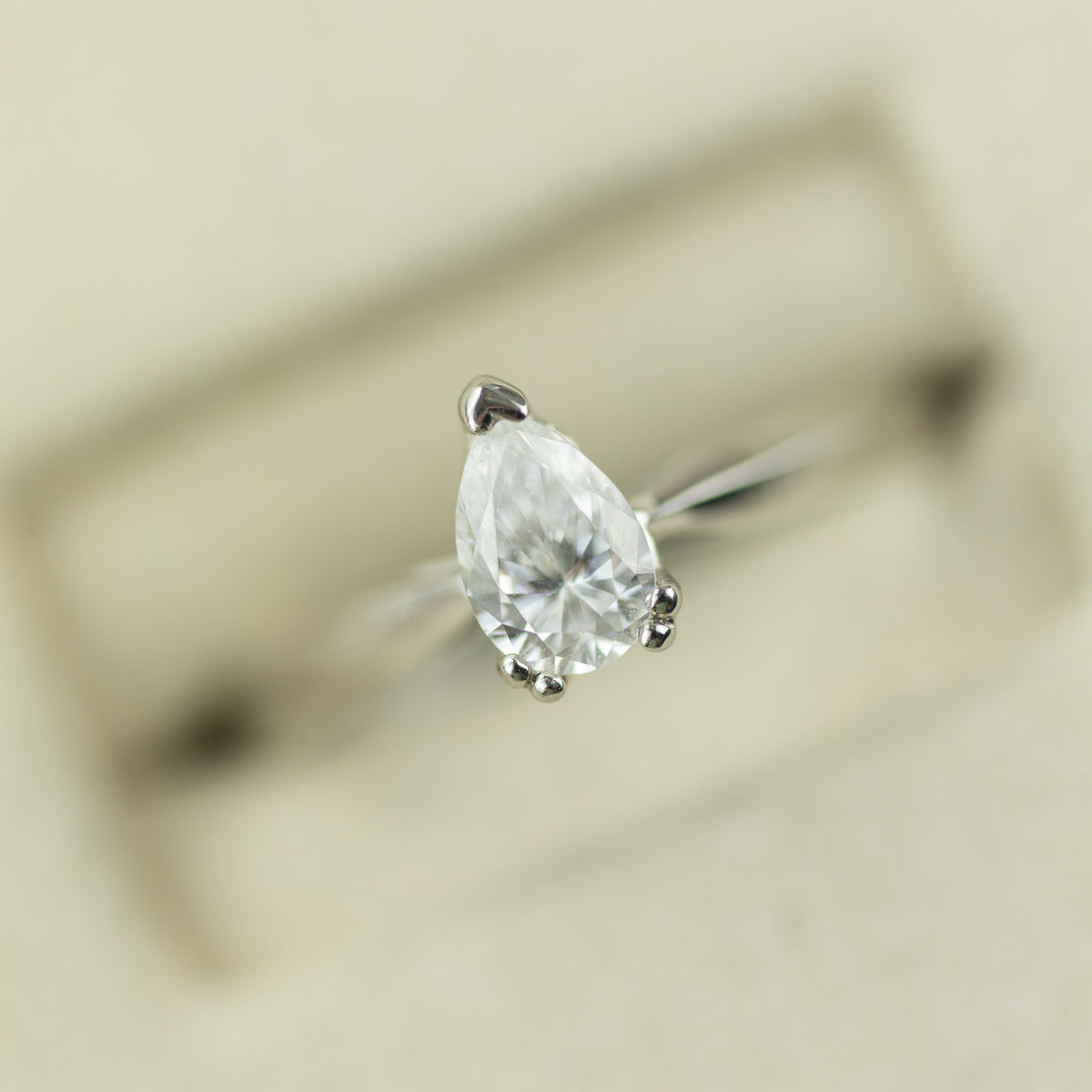 Platinum pear cut 0.52ct diamond solitaire ring