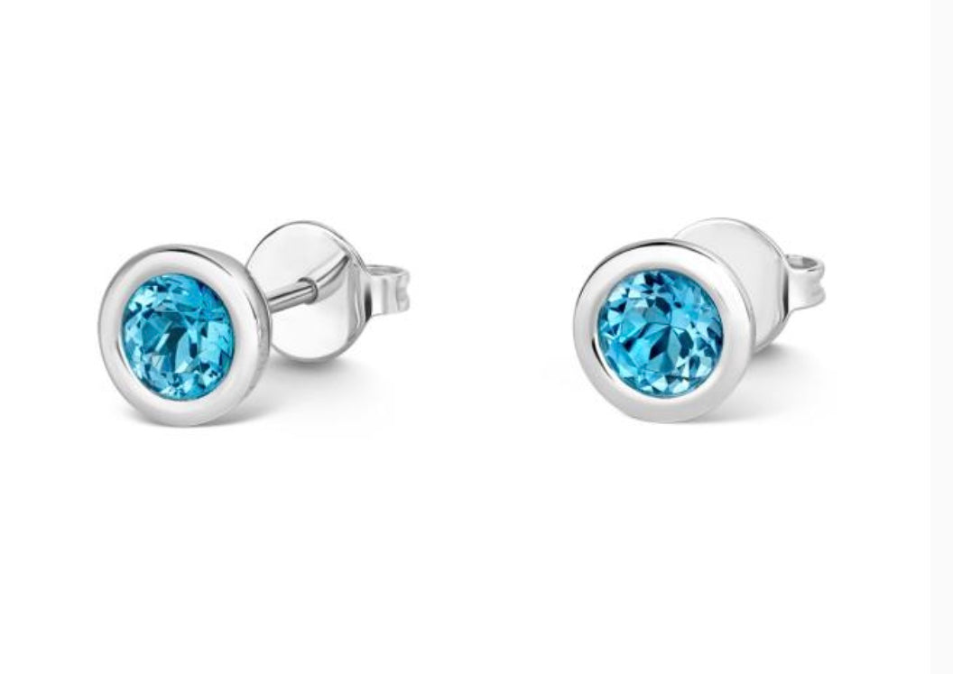 18ct white gold round brilliant blue topaz bezel set stud earrings