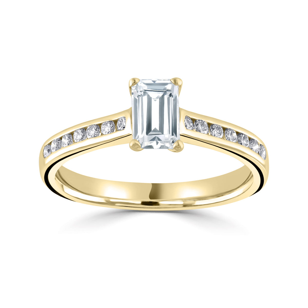 Emerald cut 4 claw diamond channel set ring
