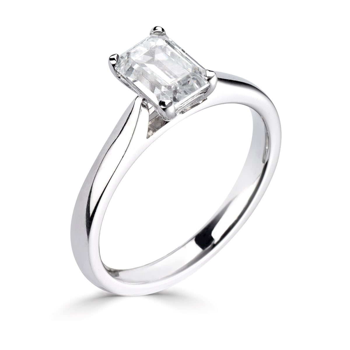 Emerald cut 4 claw diamond ring