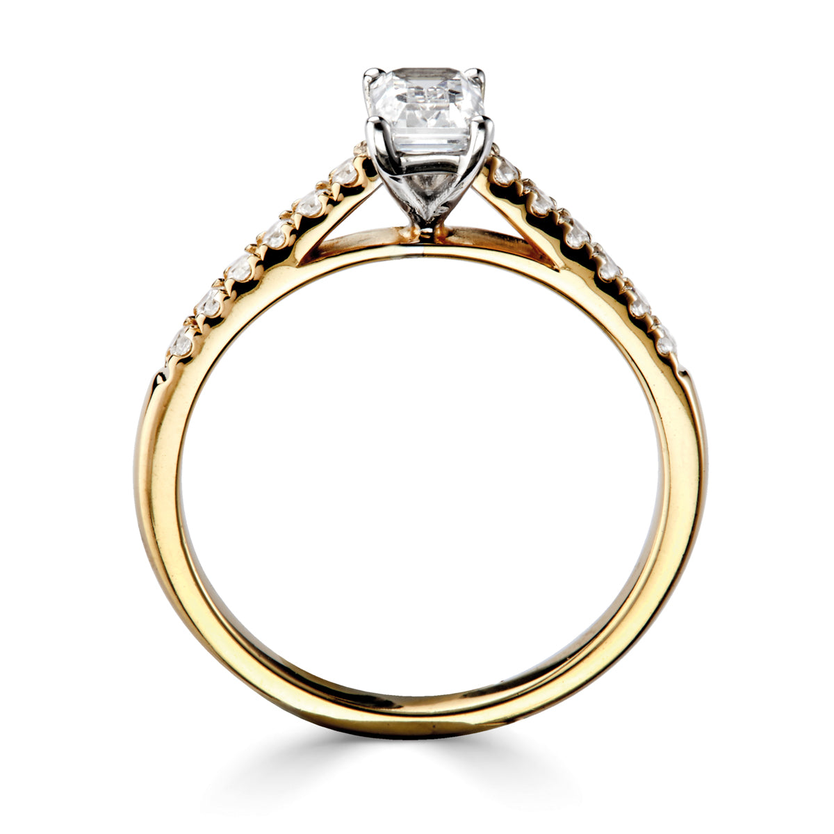 Emerald cut diamond 4 claw set with diamond shoulders engagement ring