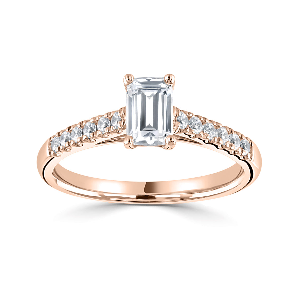 Emerald cut diamond 4 claw set with diamond shoulders engagement ring