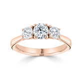 Round cut 4 claw trilogy diamond ring