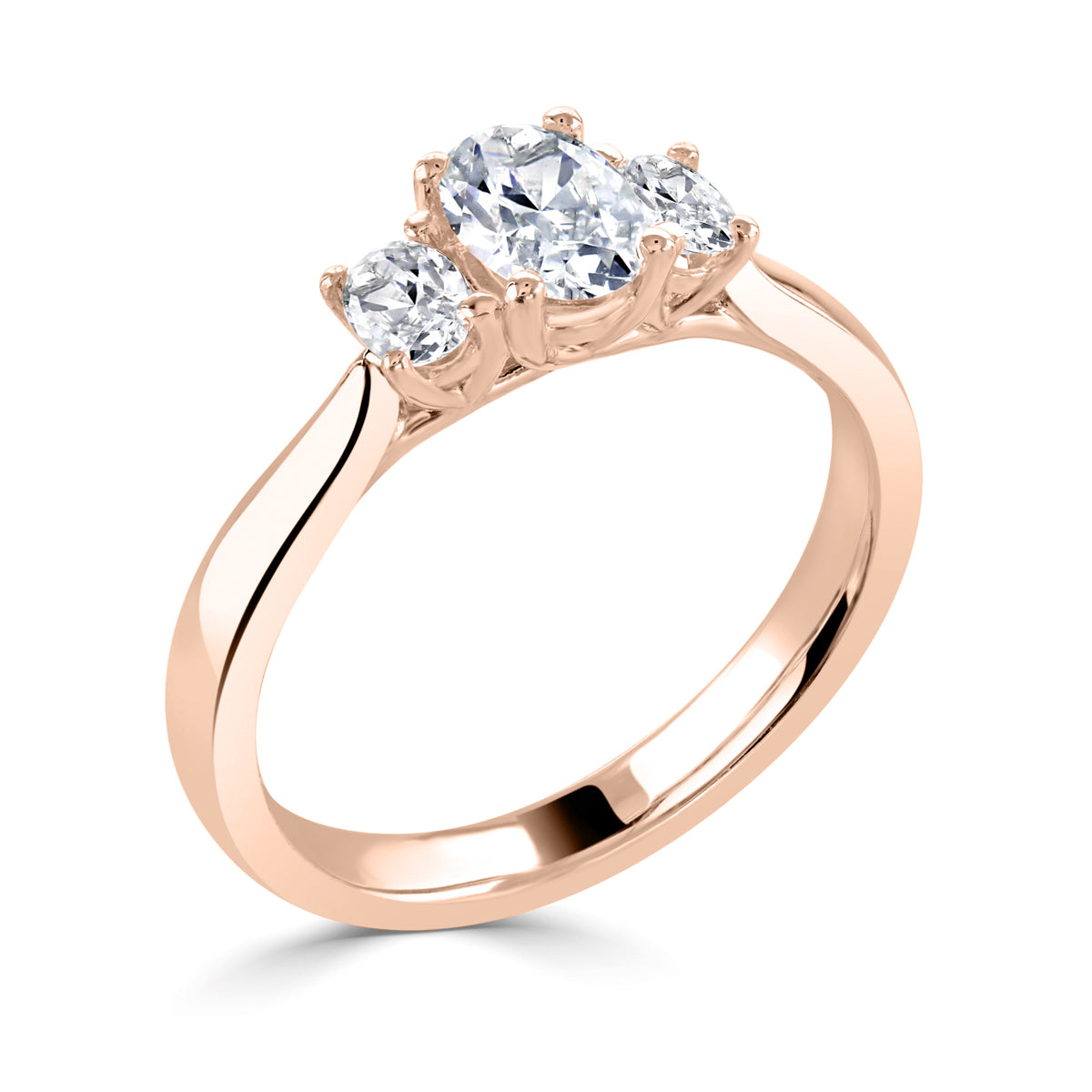 Oval cut 4 claw trilogy diamond ring