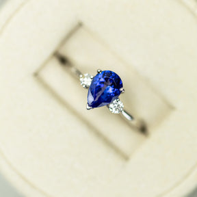 18ct White Gold Pear Cut Tanzanite Ring With Diamond Accents available at RR Jewellers Yarm