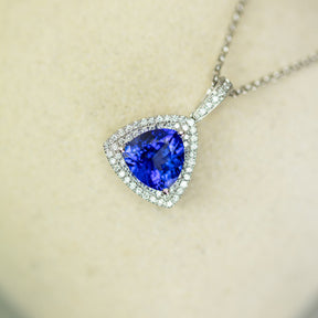 18ct White Gold Trilliant Cut Tanzanite And Diamond Double Halo Pendant At RR Jewellers Yarm