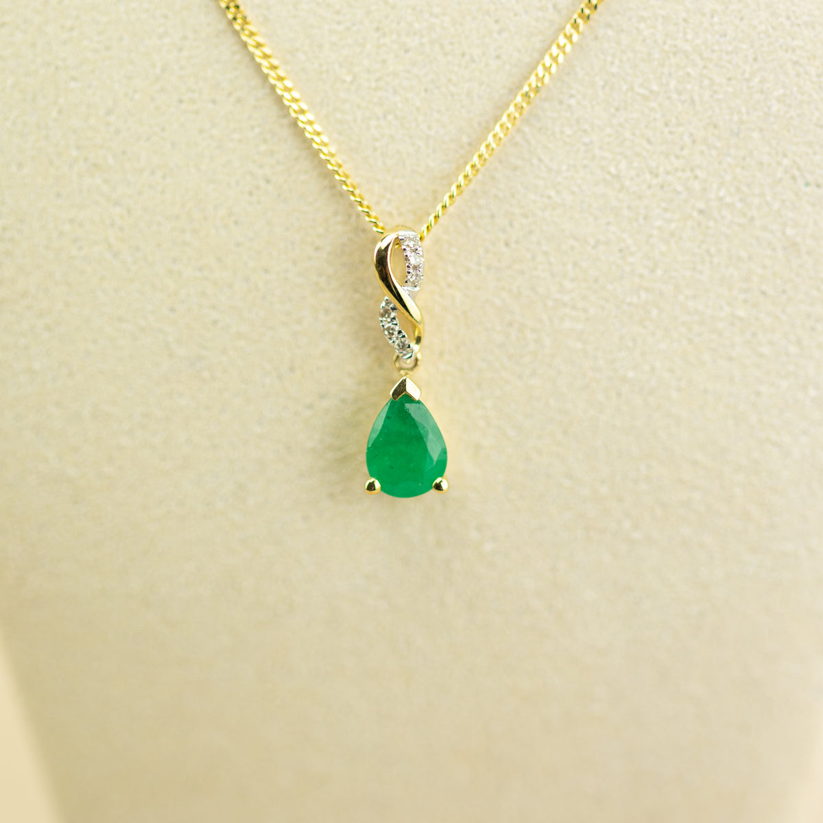 9ct white gold emerald pear cut diamond set infinity bale pendant 16-18”