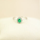 9ct white gold emerald and diamond halo ring