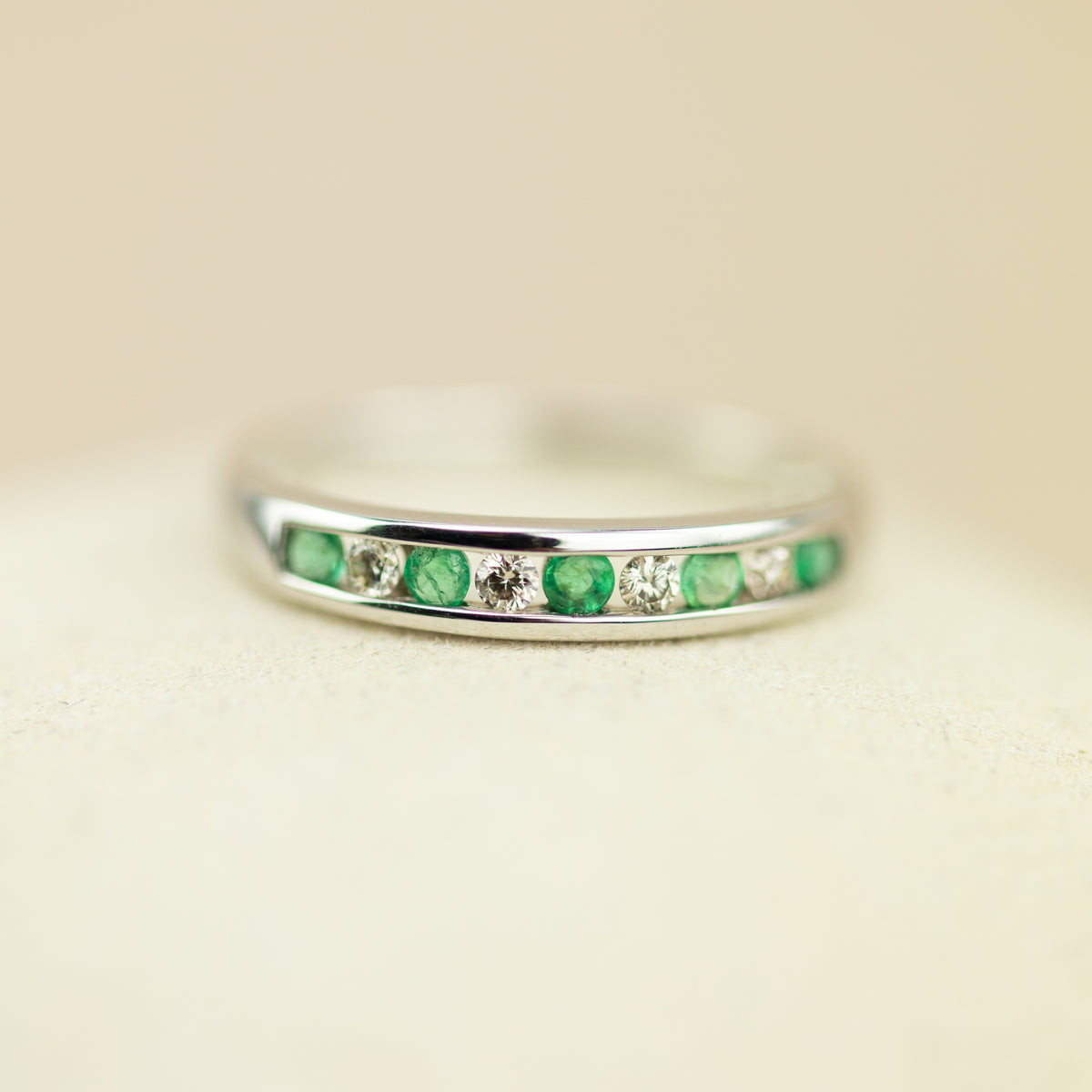 9ct white gold emerald & diamond channel set eternity ring