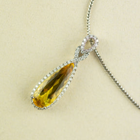 Pre - Loved 18 Karat White Gold Yellow Beryl 0.54ct Diamond Halo Drop Pendant at RR Jewellers Yarm UK