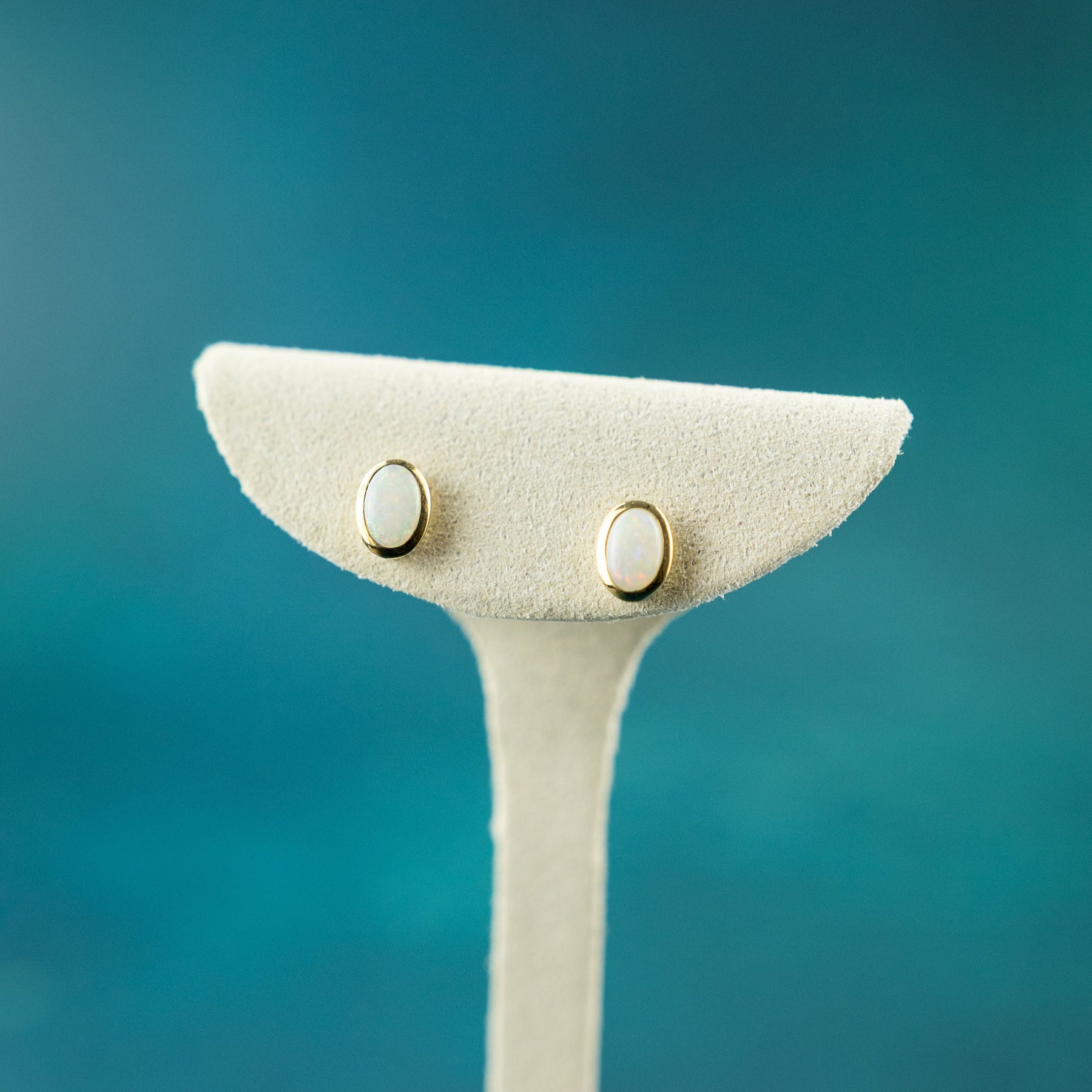 9 Karat Yellow Gold Opal Rub Over Studs