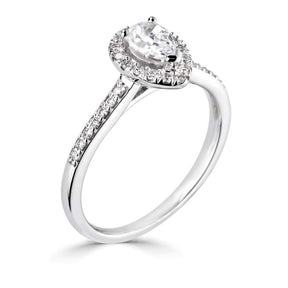 Platinum 0.47ct pear cut diamond halo ring with diamond shoulders